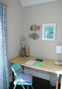 beach house desk with art