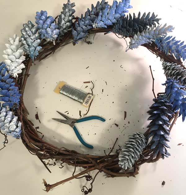 blue pine cone wreath